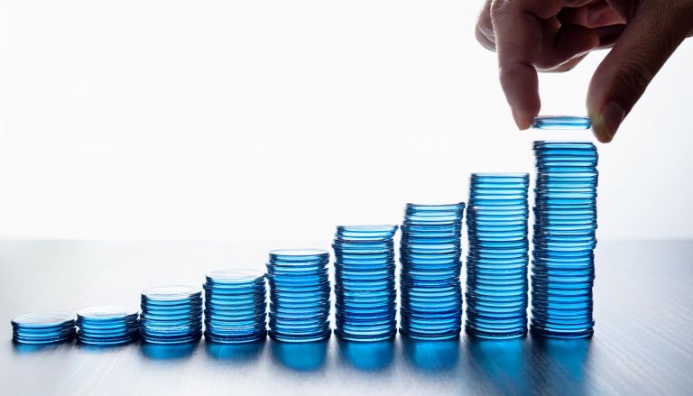 Firefly hand stacking up blue glass coins in different piles going up 27227
